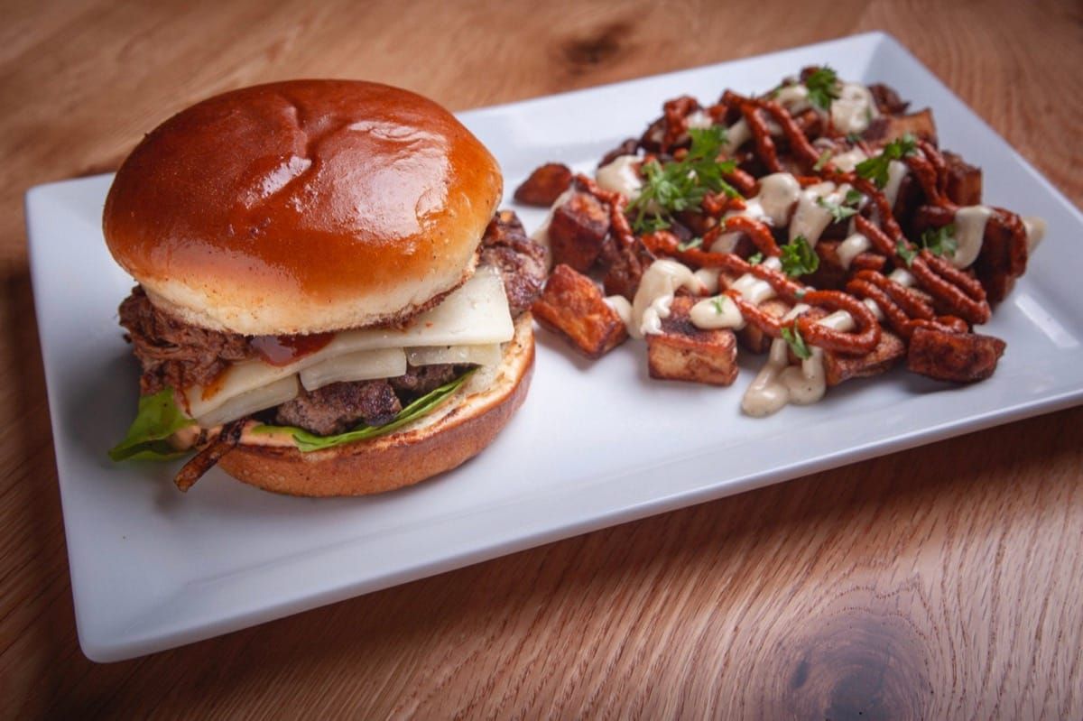 Brewhouse Smashburger with roasted pork, cheese and barbecue sauce